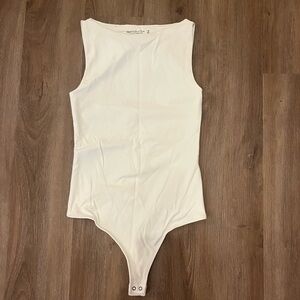White Abercrombie and Fitch Sleeveless One-Piece Bodysuit